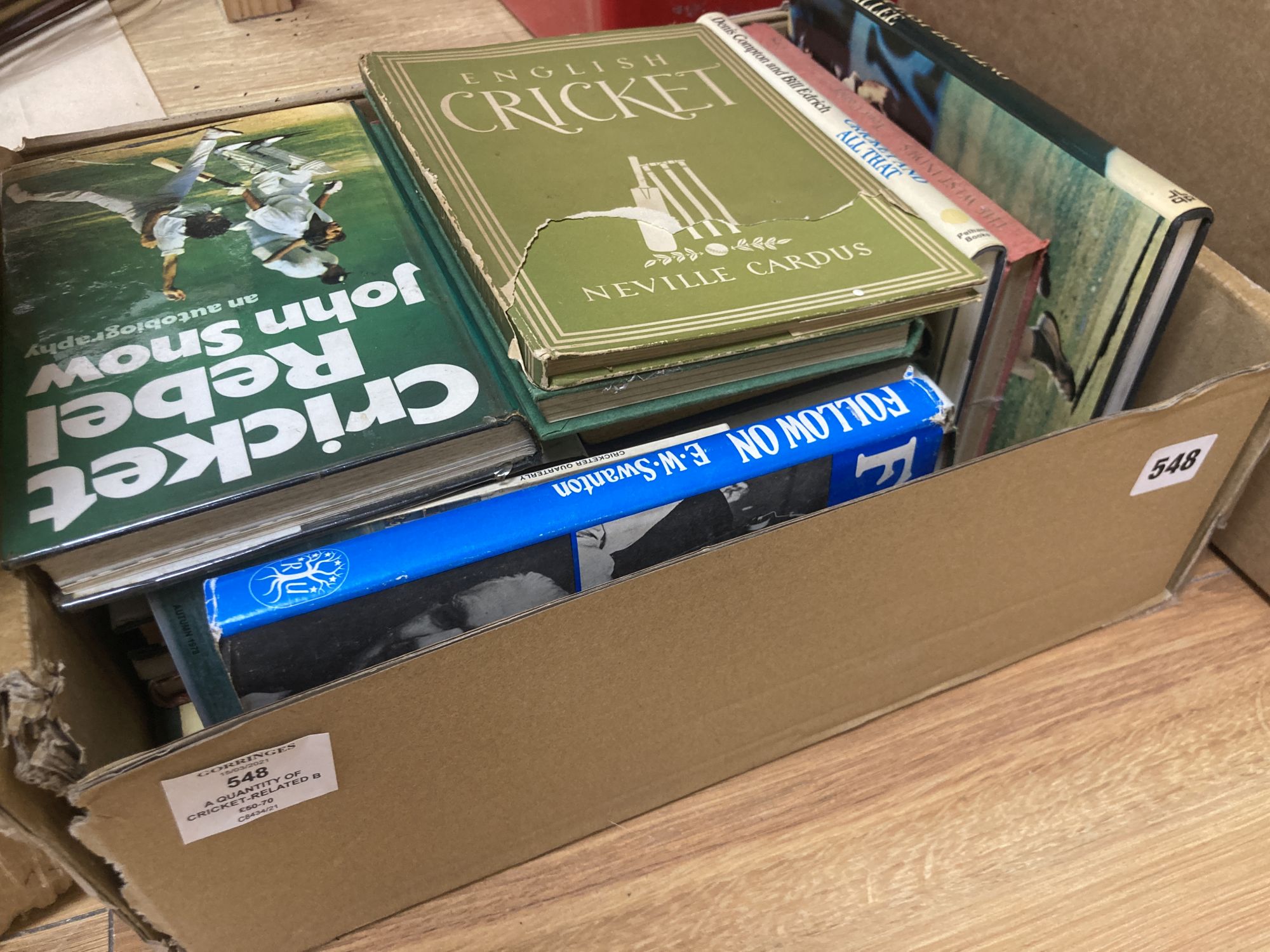 A quantity of cricket-related books